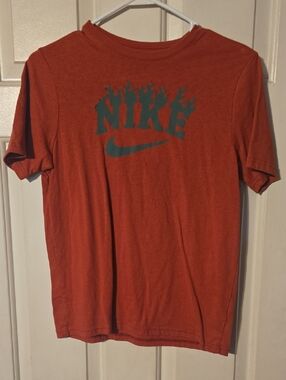 Nike Rust Orange Tee with Teal Flame Logo